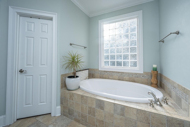 bathroom featuring tiled tub, crown molding, and a healthy amount of sunlight