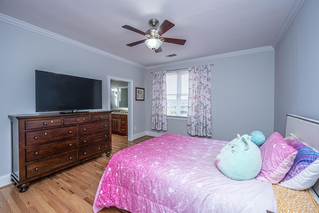 bedroom featuring ceiling fan, ornamental molding, connected bathroom, and light hardwood / wood-style flooring