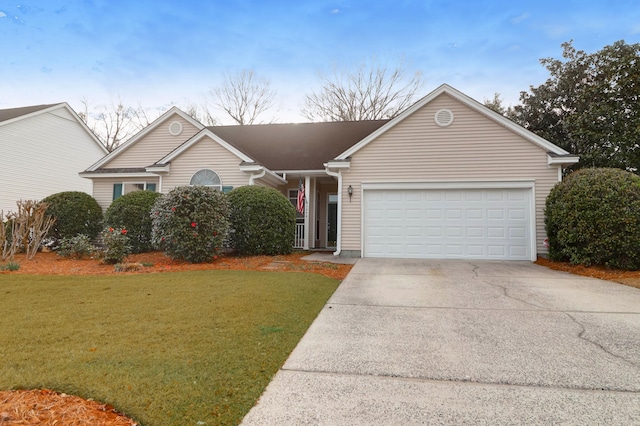 ranch-style house with an attached garage, concrete driveway, and a front lawn