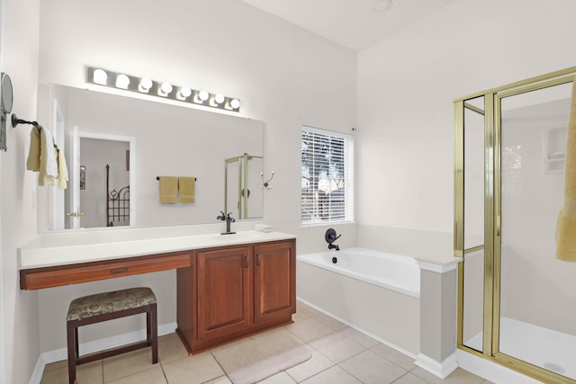 full bath featuring tile patterned floors, vanity, a bath, and a shower stall