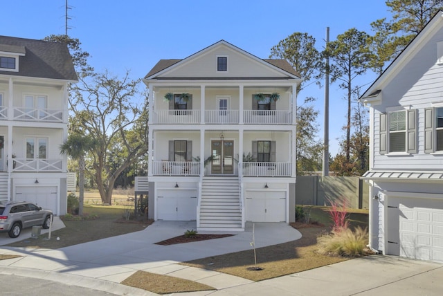 view of front facade featuring a porch and a garage