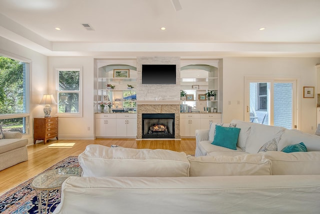 5084 Timber Race Crse, Hollywood, SC 29449 - living area featuring light wood-type flooring, a fireplace, and recessed lighting