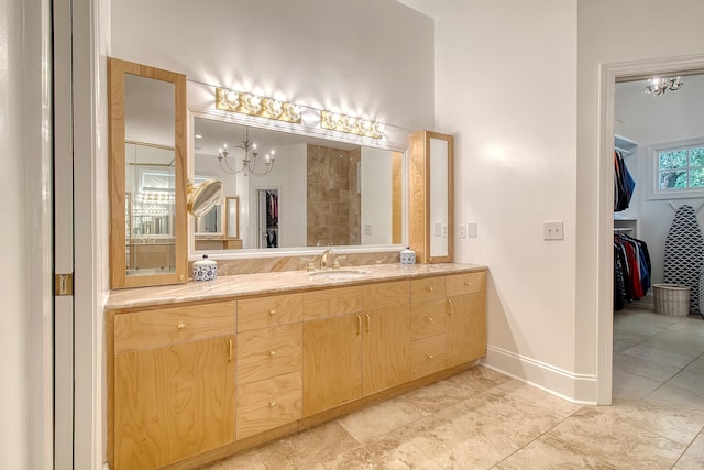 5084 Timber Race Crse, Hollywood, SC 29449 - full bathroom featuring a chandelier, vanity, and a walk in closet