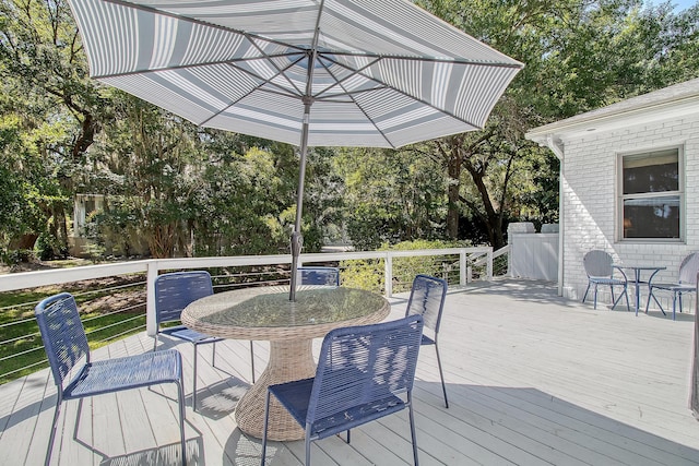 5084 Timber Race Crse, Hollywood, SC 29449 - deck featuring outdoor dining space and view of scattered trees
