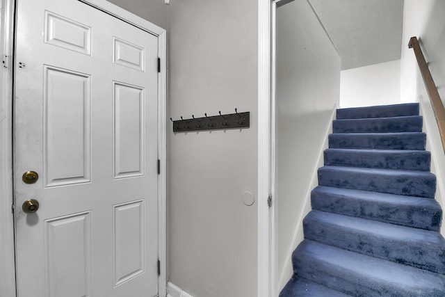 stairway with baseboards