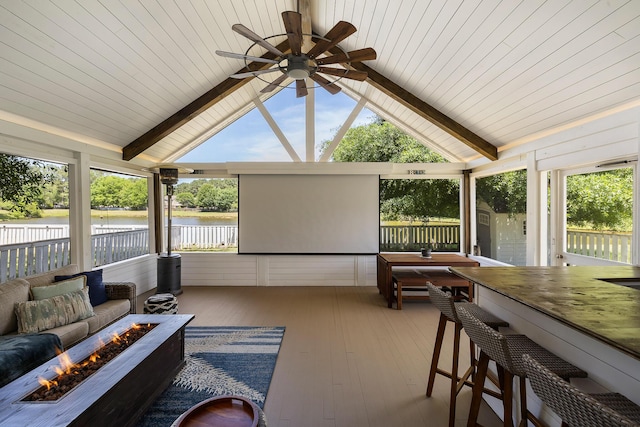 1136 Peninsula Cove Dr, Charleston, SC 29492 - sunroom / solarium with an outdoor fire pit, a water view, a ceiling fan, hardwood / wood-style flooring, and wooden ceiling