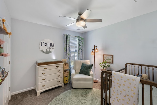 1136 Peninsula Cove Dr, Charleston, SC 29492 - bedroom featuring carpet flooring, a nursery area, baseboards, and ceiling fan