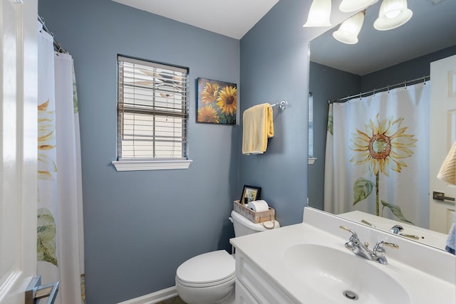 1136 Peninsula Cove Dr, Charleston, SC 29492 - full bathroom with toilet, baseboards, and vanity