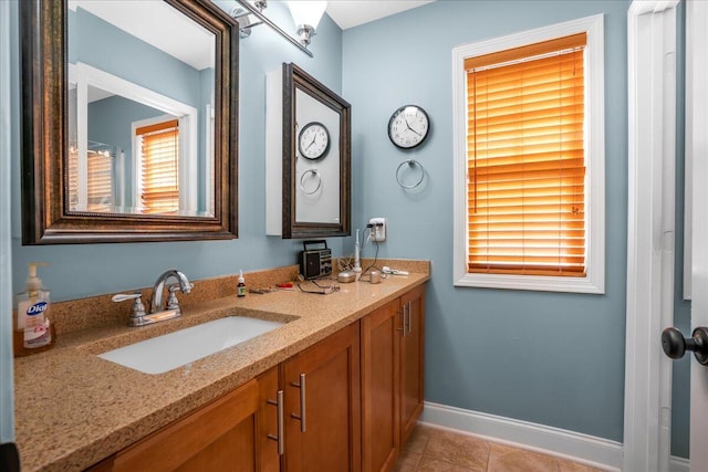 bathroom featuring vanity and tile patterned flooring