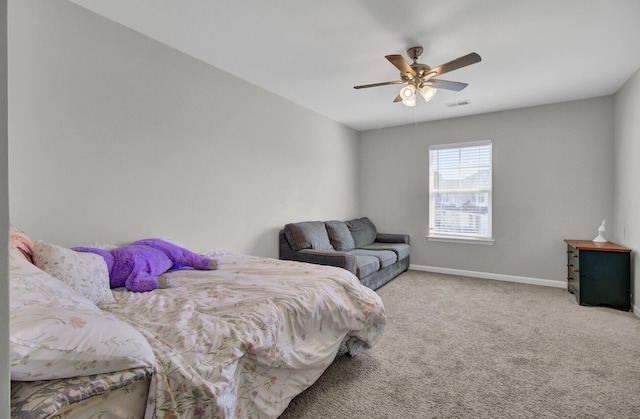 bedroom with ceiling fan and carpet flooring