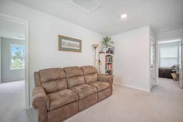 452 Minim St, Charleston, SC 29414 - living room with light colored carpet and baseboards