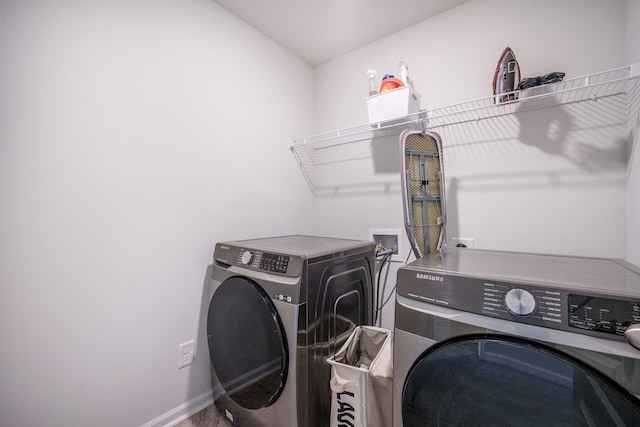 452 Minim St, Charleston, SC 29414 - washroom featuring washing machine and clothes dryer and baseboards
