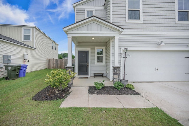 452 Minim St, Charleston, SC 29414 - view of front of house with an attached garage, board and batten siding, and driveway