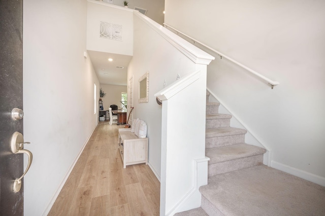 452 Minim St, Charleston, SC 29414 - stairway with wood finished floors and baseboards