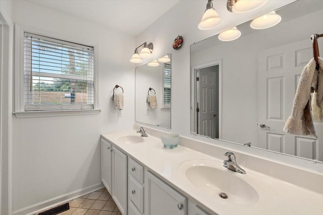 bathroom with vanity and tile patterned floors