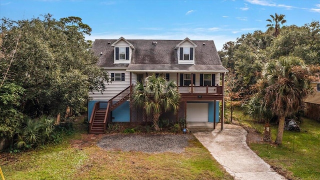 view of front facade with a garage and covered porch