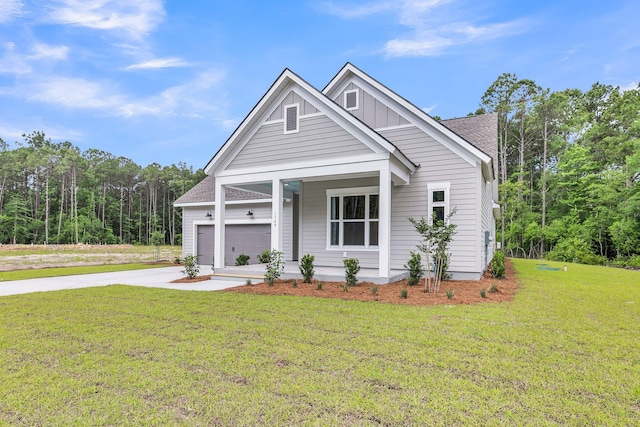 1149 Reserve Ln, Awendaw, SC 29429 - view of front facade with driveway, a front yard, covered porch, board and batten siding, and a shingled roof