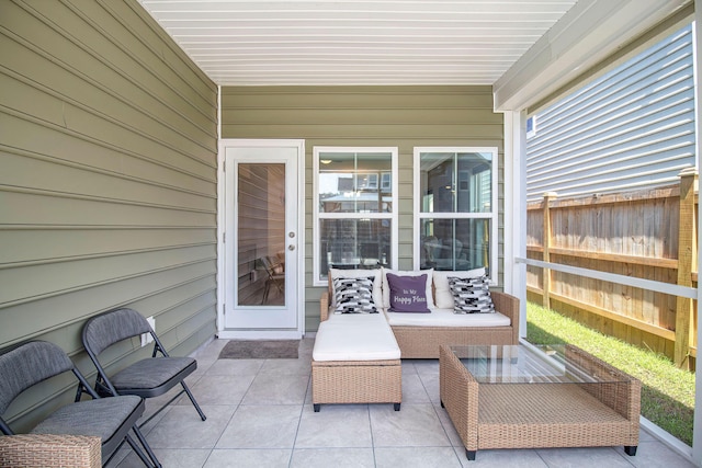 view of patio / terrace with fence and an outdoor hangout area