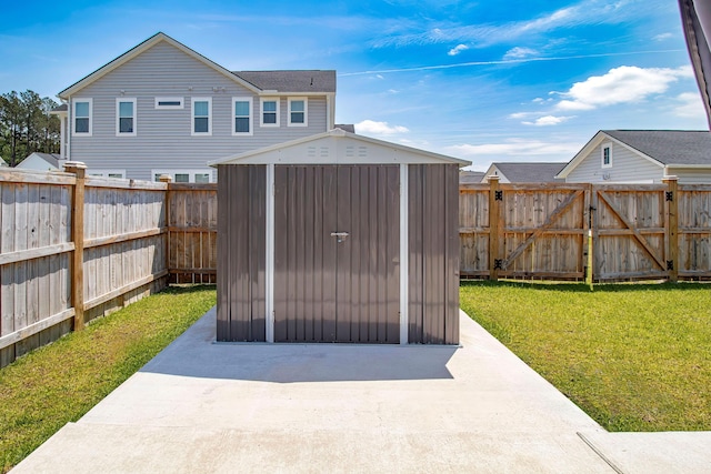 view of shed with a fenced backyard