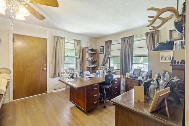 2703 Phyllis St, North Charleston, SC 29405 - home office featuring a textured ceiling, light wood-style floors, plenty of natural light, and a ceiling fan