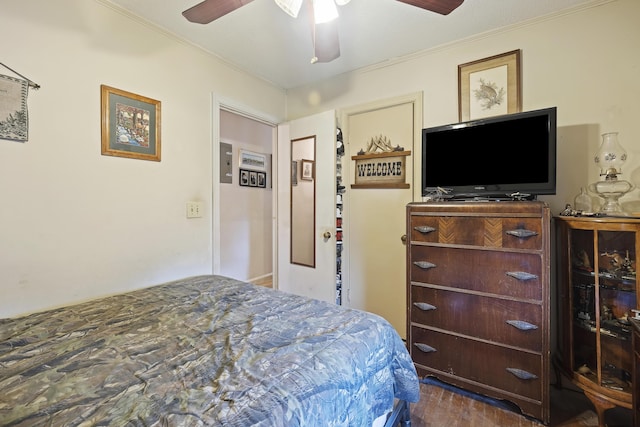 2703 Phyllis St, North Charleston, SC 29405 - bedroom with ornamental molding, wood finished floors, and a ceiling fan