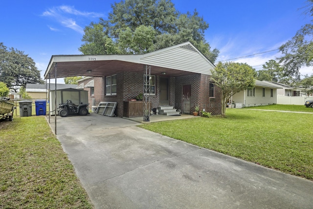 2703 Phyllis St, North Charleston, SC 29405 - single story home featuring brick siding, driveway, a front lawn, and a carport