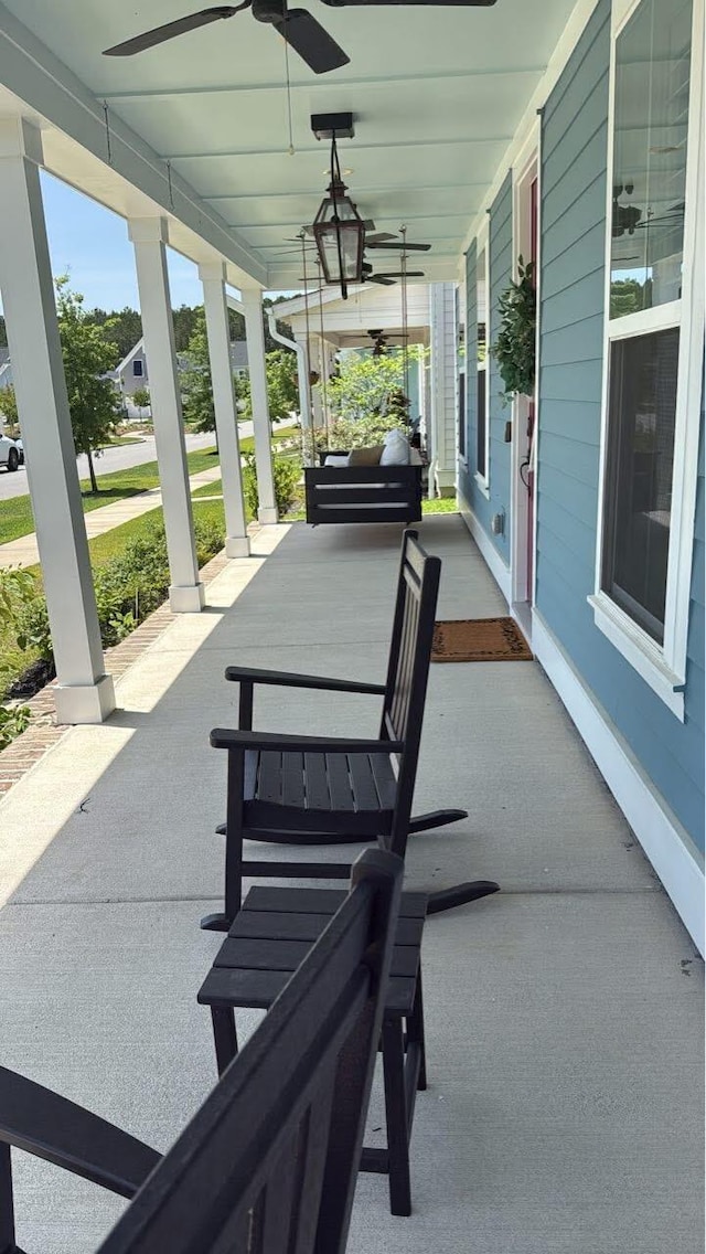 view of patio with a porch and ceiling fan