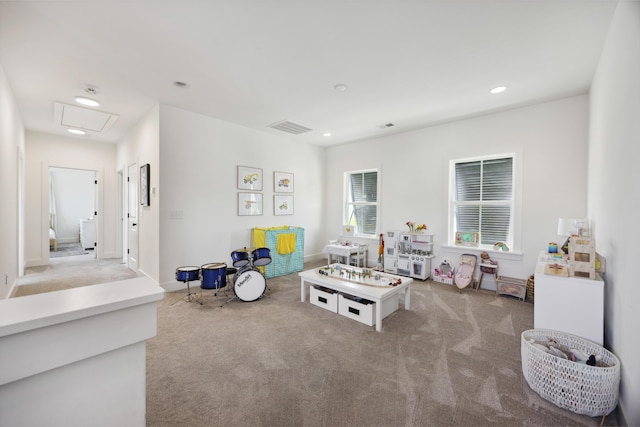 recreation room featuring carpet floors, recessed lighting, and baseboards