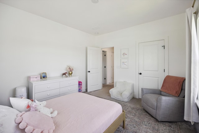 bedroom featuring carpet flooring