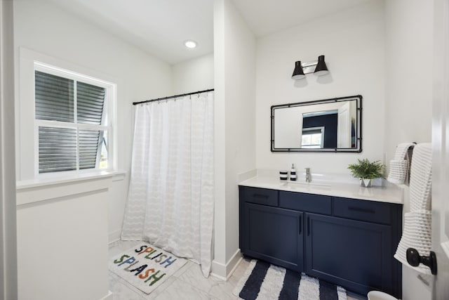 bathroom with marble finish floors, baseboards, vanity, recessed lighting, and a shower with curtain