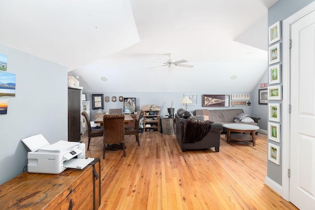 office area with ceiling fan, lofted ceiling, and light wood-type flooring