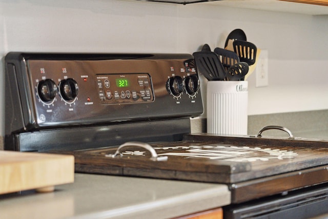 interior details with black range oven