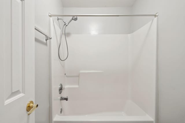 bathroom featuring washtub / shower combination