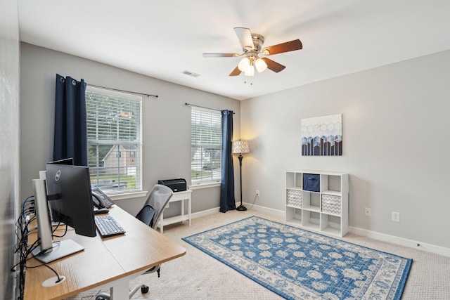 office area with ceiling fan and carpet floors