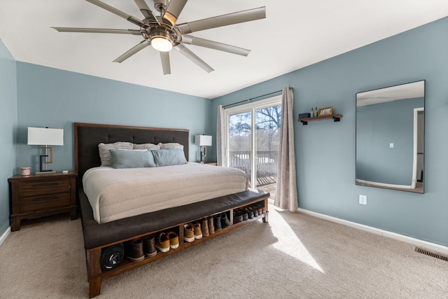 carpeted bedroom featuring visible vents, baseboards, a ceiling fan, and access to outside