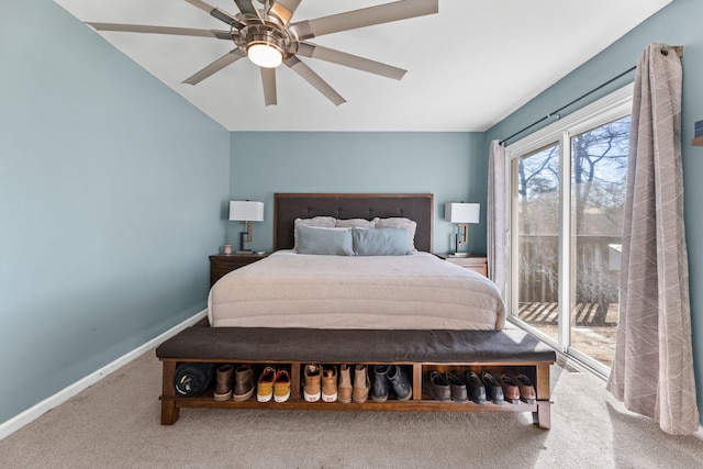 carpeted bedroom featuring access to exterior, a ceiling fan, and baseboards