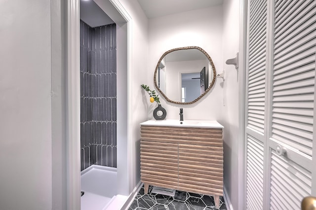 bathroom featuring vanity and tile patterned floors