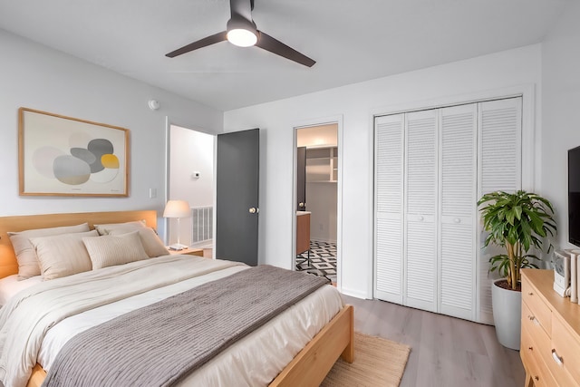 bedroom featuring ceiling fan and light hardwood / wood-style floors