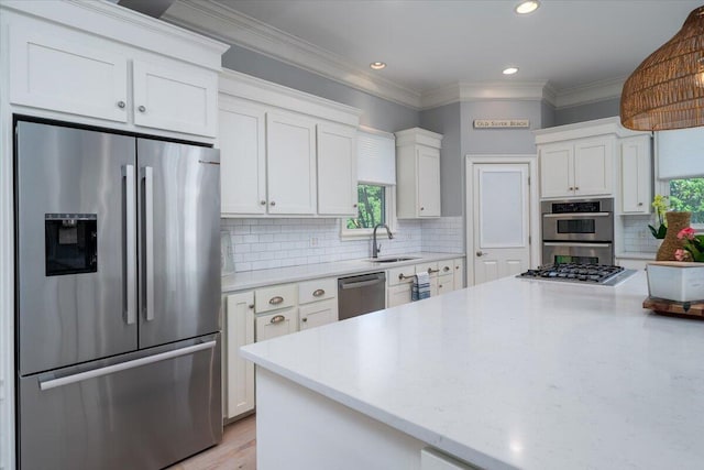 764 Post Oak Dr, Mount Pleasant, SC 29464 - kitchen featuring appliances with stainless steel finishes, healthy amount of natural light, white cabinetry, a sink, and recessed lighting