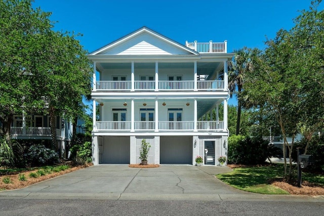 764 Post Oak Dr, Mount Pleasant, SC 29464 - view of front of house with french doors, a balcony, an attached garage, and concrete driveway