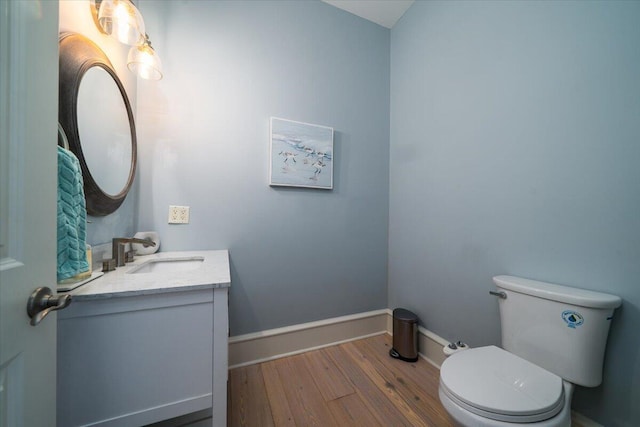 764 Post Oak Dr, Mount Pleasant, SC 29464 - half bath featuring vanity, wood finished floors, toilet, and baseboards