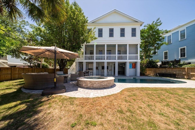 764 Post Oak Dr, Mount Pleasant, SC 29464 - rear view of property featuring a patio, an outdoor hangout area, and a sunroom