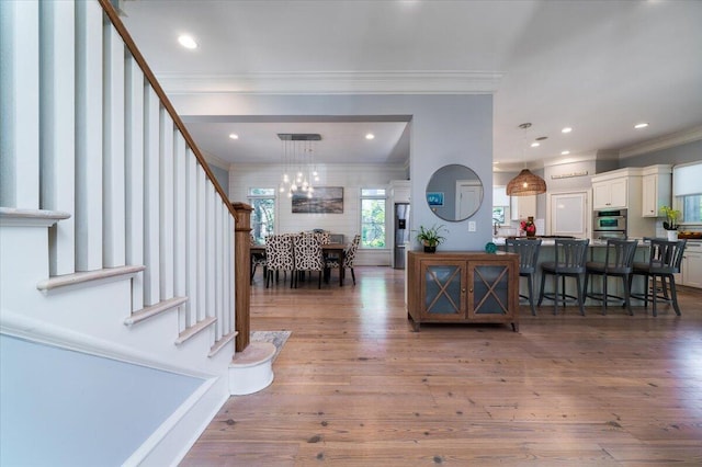 764 Post Oak Dr, Mount Pleasant, SC 29464 - foyer with ornamental molding, hardwood / wood-style flooring, stairway, and recessed lighting