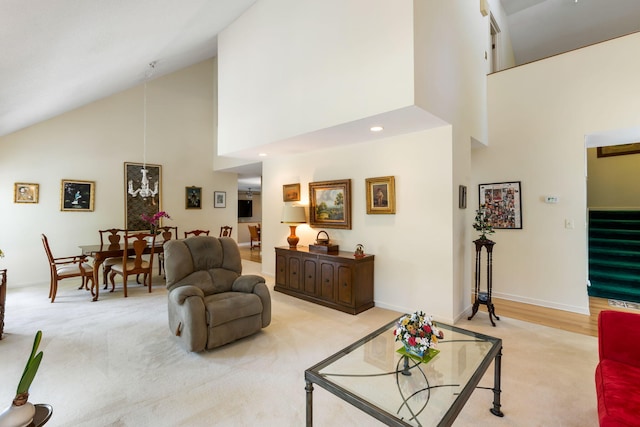 2653 Seabrook Island Rd, Seabrook Island, SC 29455 - living room with high vaulted ceiling, light colored carpet, stairway, and baseboards