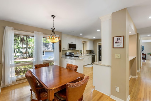 2653 Seabrook Island Rd, Seabrook Island, SC 29455 - dining room featuring light wood-style flooring, healthy amount of natural light, baseboards, and recessed lighting
