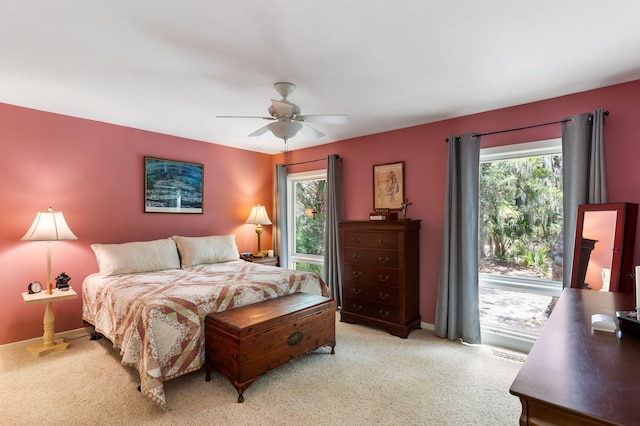 2653 Seabrook Island Rd, Seabrook Island, SC 29455 - bedroom with multiple windows, light carpet, and ceiling fan