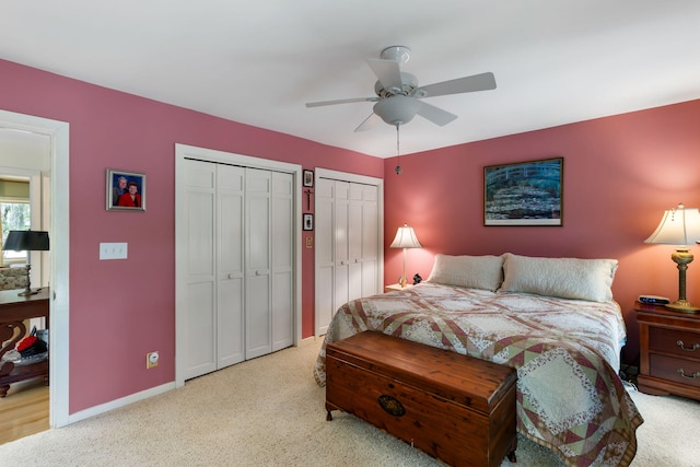 2653 Seabrook Island Rd, Seabrook Island, SC 29455 - bedroom featuring multiple closets, light carpet, baseboards, and ceiling fan