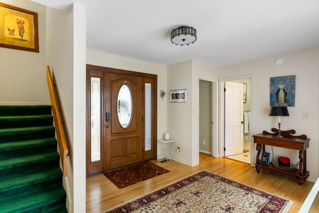2653 Seabrook Island Rd, Seabrook Island, SC 29455 - foyer entrance featuring light wood-type flooring, stairs, and baseboards