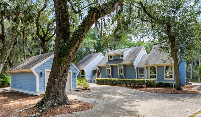 2653 Seabrook Island Rd, Seabrook Island, SC 29455 - view of front of property with a garage and a shingled roof