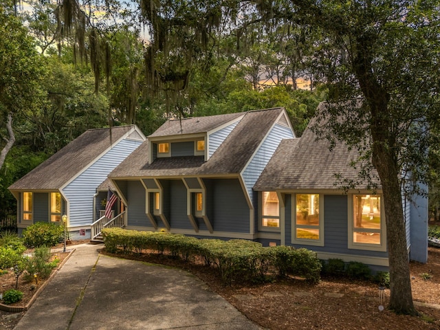 2653 Seabrook Island Rd, Seabrook Island, SC 29455 - view of front of home with a porch and roof with shingles